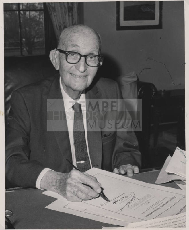 Hayden signing Official Document