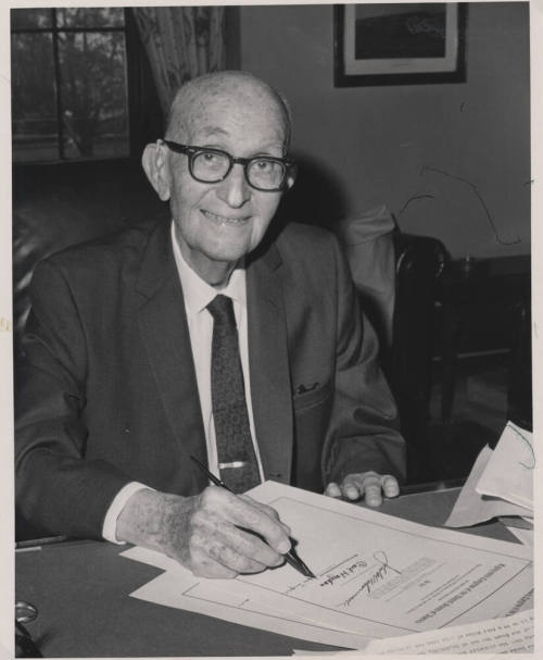 Hayden signing Official Document