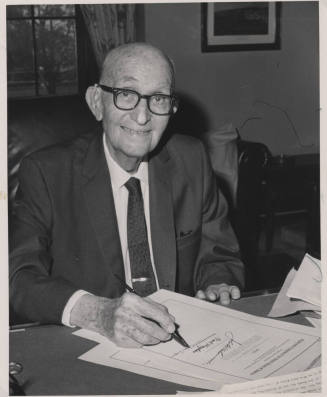 Hayden signing Official Document