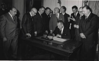 President Lyndon B. Johnson Signs Bill