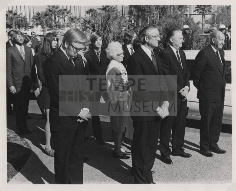 Group of People in Formal Attire Gathered