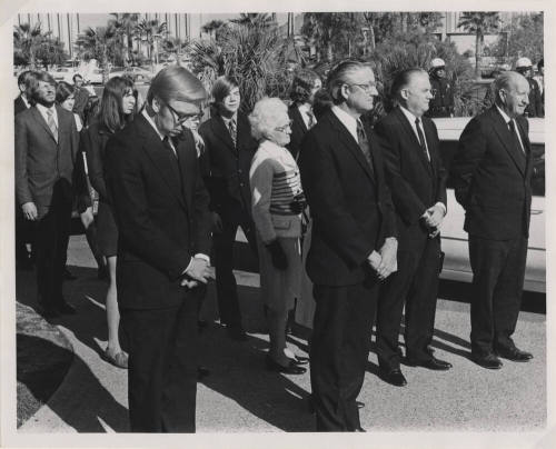 Group of People in Formal Attire Gathered