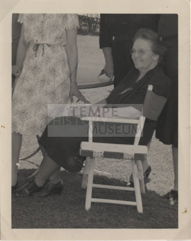 Older Sallie Hayden Sitting Outside