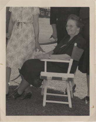 Older Sallie Hayden Sitting Outside