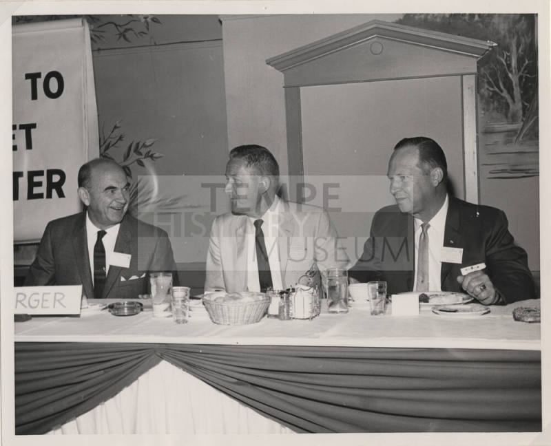 Larry Hayden and Two other Men at the Head Table of an Event