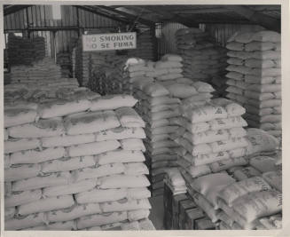 Piles of Flour Sacks Inside a Building
