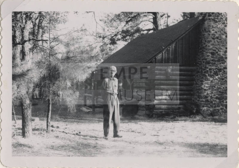 Willard Hart in Front of Sallie Hayden's Cabin
