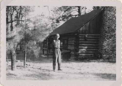 Willard Hart in Front of Sallie Hayden's Cabin