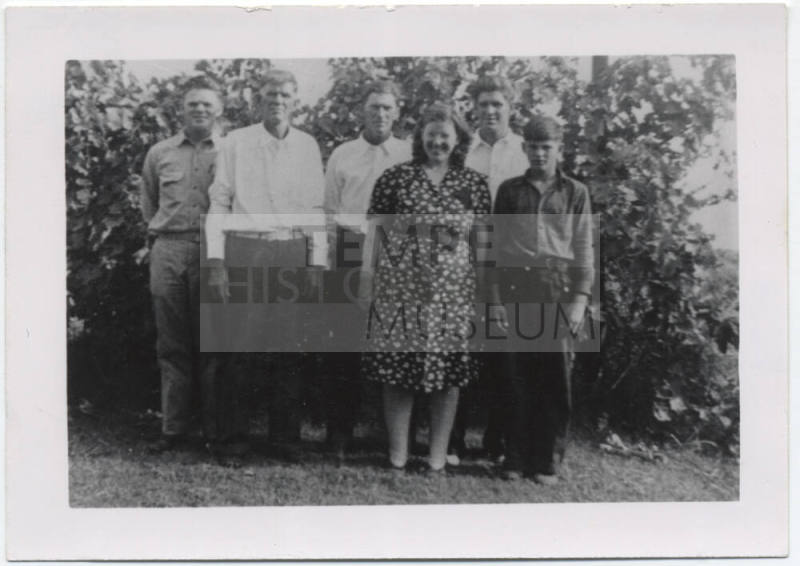 Photograph of Arizona Harris with Family at a Funeral
