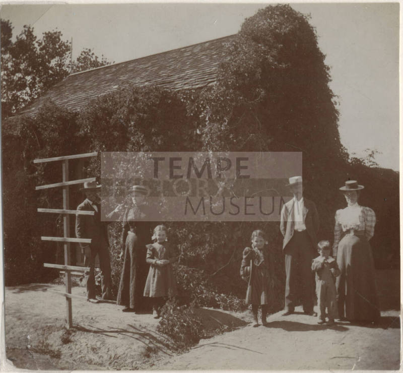 Johnson Family outside Home