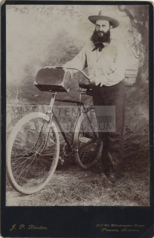 Dr. Fenn Hart with a Bicycle