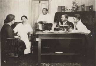 Sigala family and a teacher in the Sigala home.