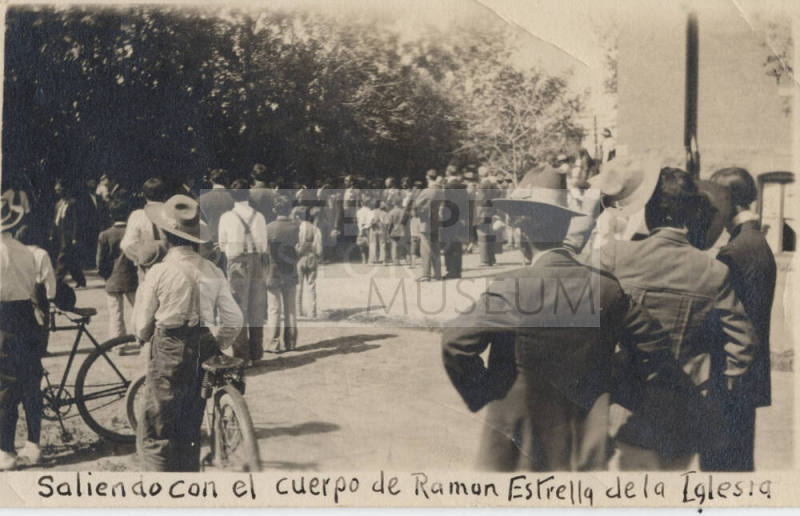 Taking the body of Ramon Estrella from the church