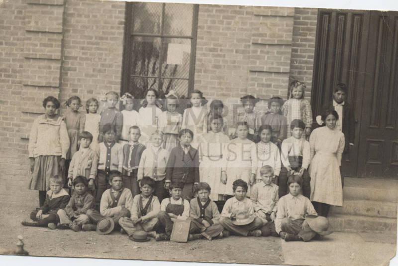 Roy Sigala and other students in a first and second grade class picture.