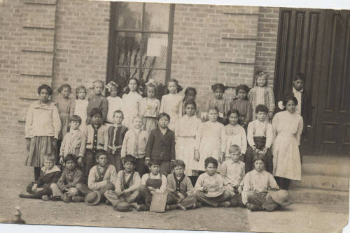 Roy Sigala and other students in a first and second grade class picture.