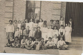 Roy Sigala and other students in a first and second grade class picture.