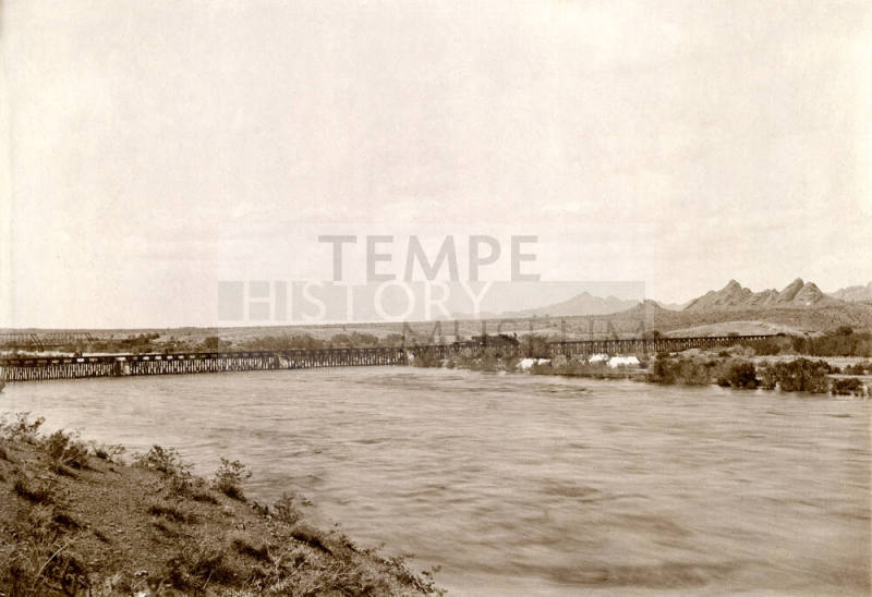 Flood Stage picture of the Salt River with the  Phoenix & Eastern Railroad Bridge (aka Santa Fe Bridge) and another bridge in the background