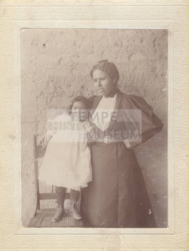 Sepia photograph of a woman and child