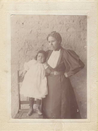Sepia photograph of a woman and child