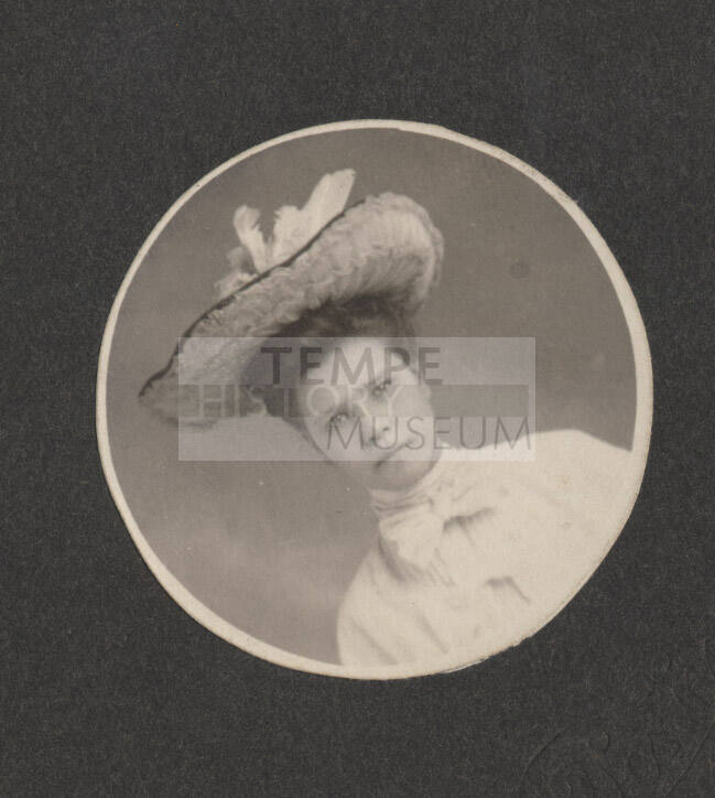 Woman wearing large hat