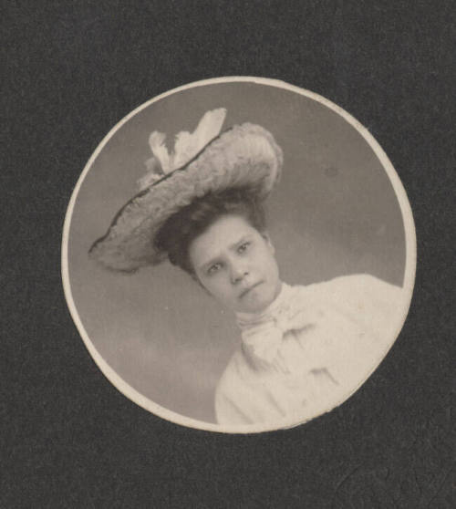 Woman wearing large hat