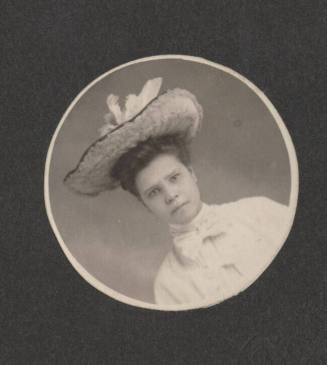 Woman wearing large hat