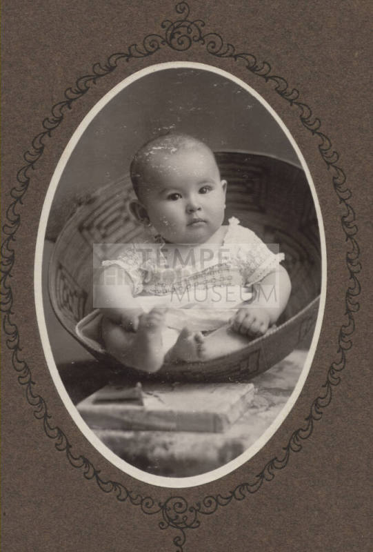 Baby Matley in a basket