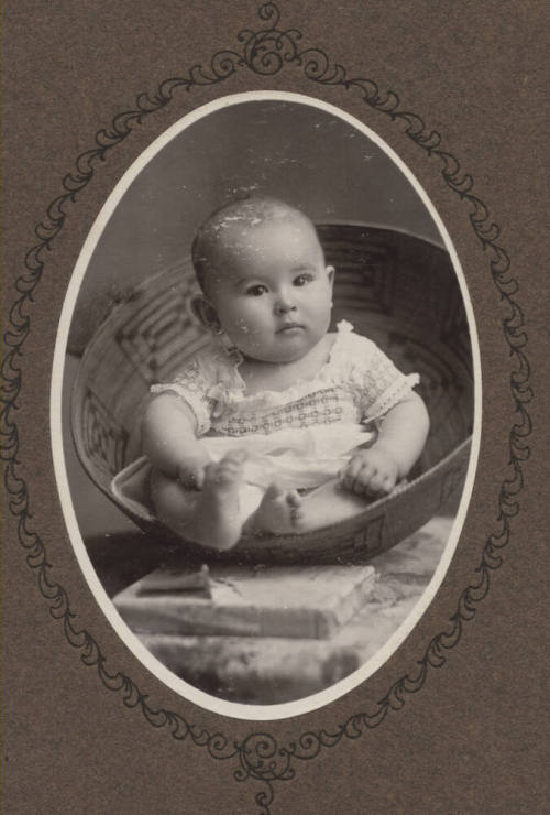 Baby Matley in a basket