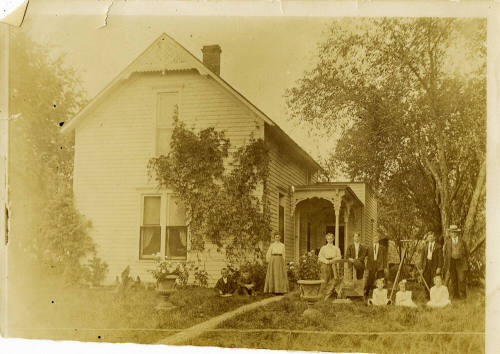 Family portrait of Cushman family outside their home in Ohio.