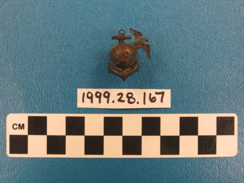 United State Marine Corps insignia (with eagle, globe, and anchor).