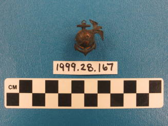 United State Marine Corps insignia (with eagle, globe, and anchor).