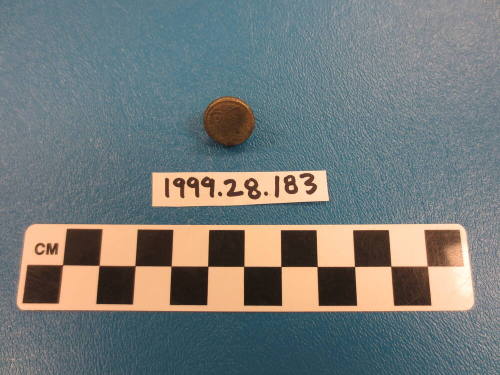 Pin (possibly a tie tac or lapel pin)