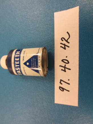 Tin, Denture adhesive