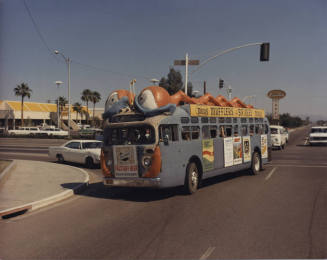"Bug Line" Bus on a City Street