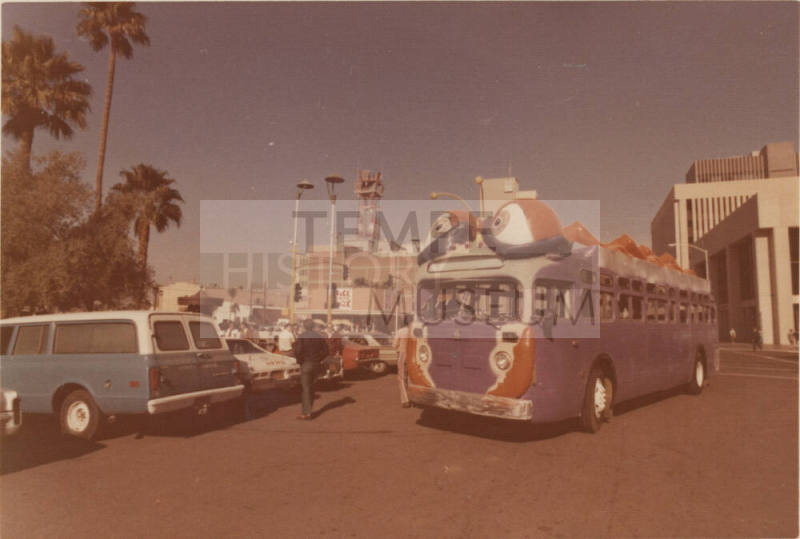 "Bug Line" Bus in a Parking Lot
