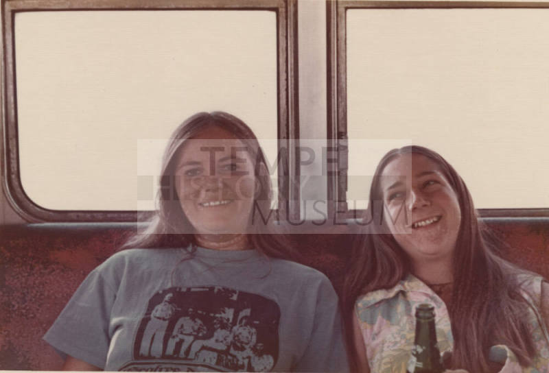 Two Riders inside the Bus