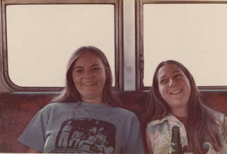 Two Riders inside the Bus