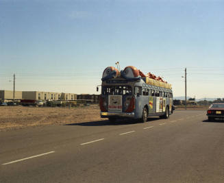 Bugline bus on road