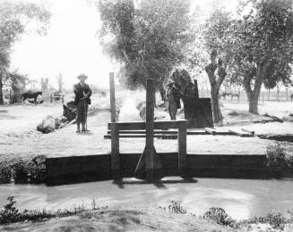 Controlling water from main canal to lateral canals