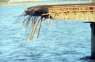 Closeup of bridge destruction.
