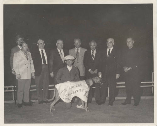 Sun Angels Charity with greyhound and group
