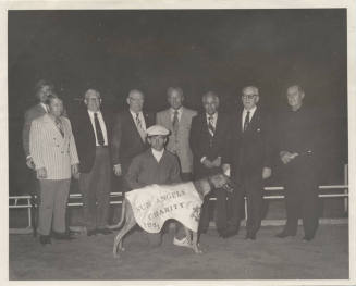 Sun Angels Charity with greyhound and group