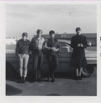 Hearsemen in Front of Car in Danelle Plaza