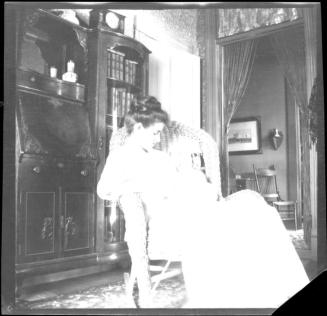 Image of Ruby Tucker Woolf holding son