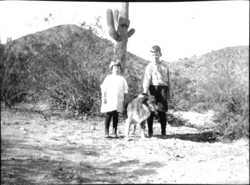 Dorothy and Charles Harold with dog in the desert