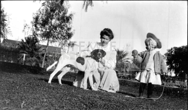 Ruby and Charles Harold with dog