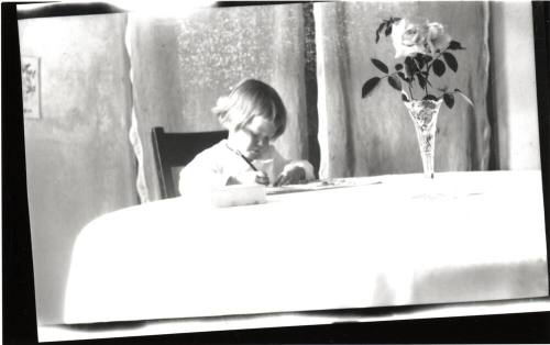 Dorothy writing at table