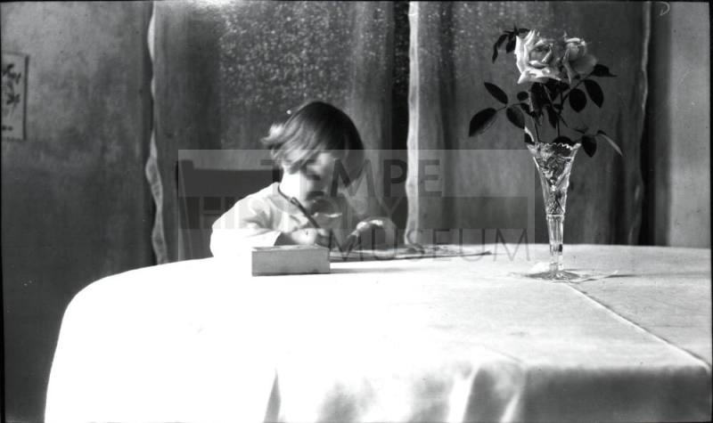 Dorothy writing at table