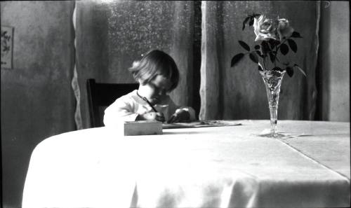 Dorothy writing at table