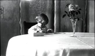 Dorothy writing at table